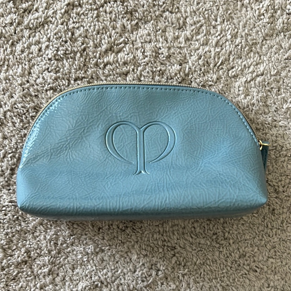 Cle de peau makeup bag
